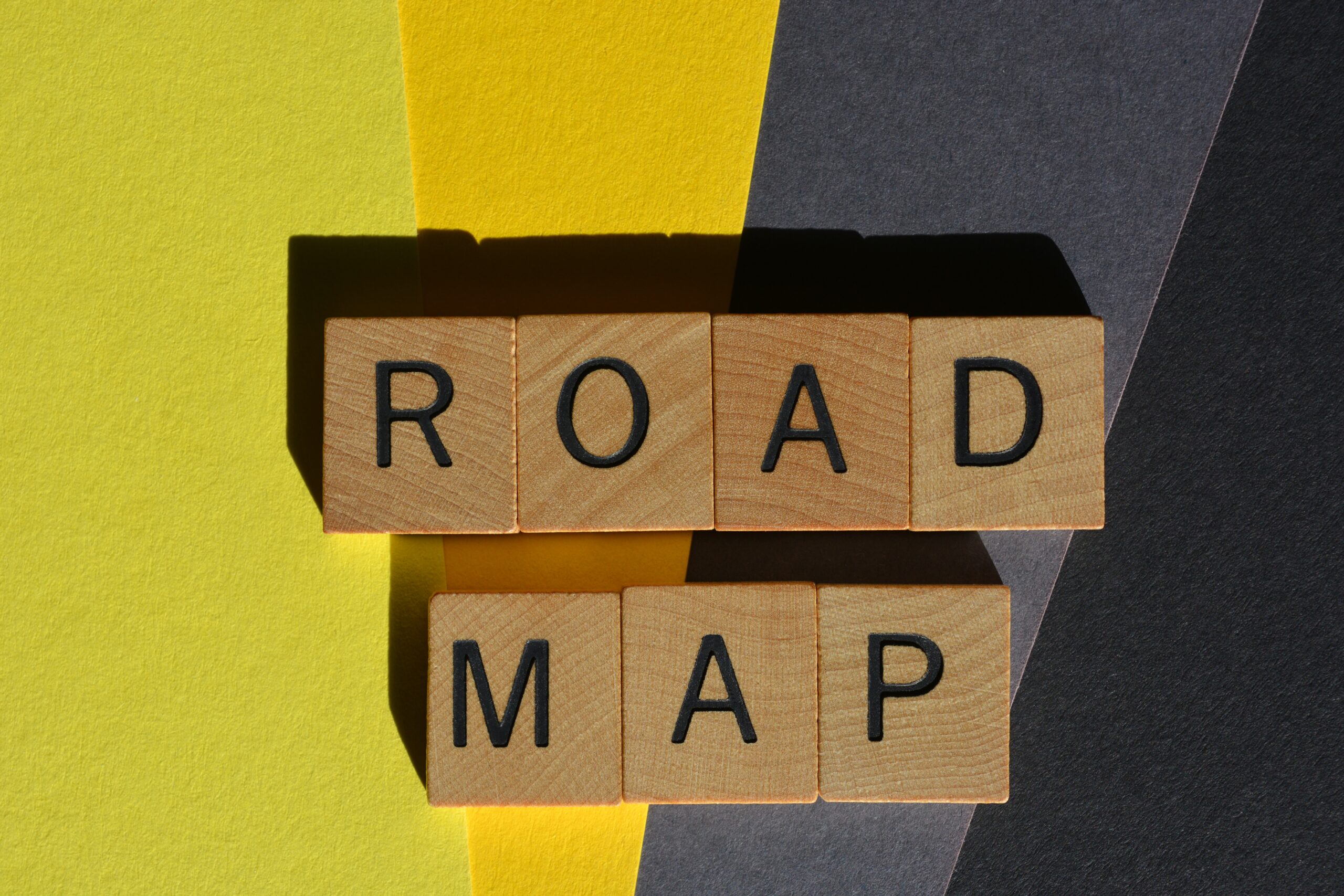 Road Map, words in wooden alphabet letters, used to express a plan of action
